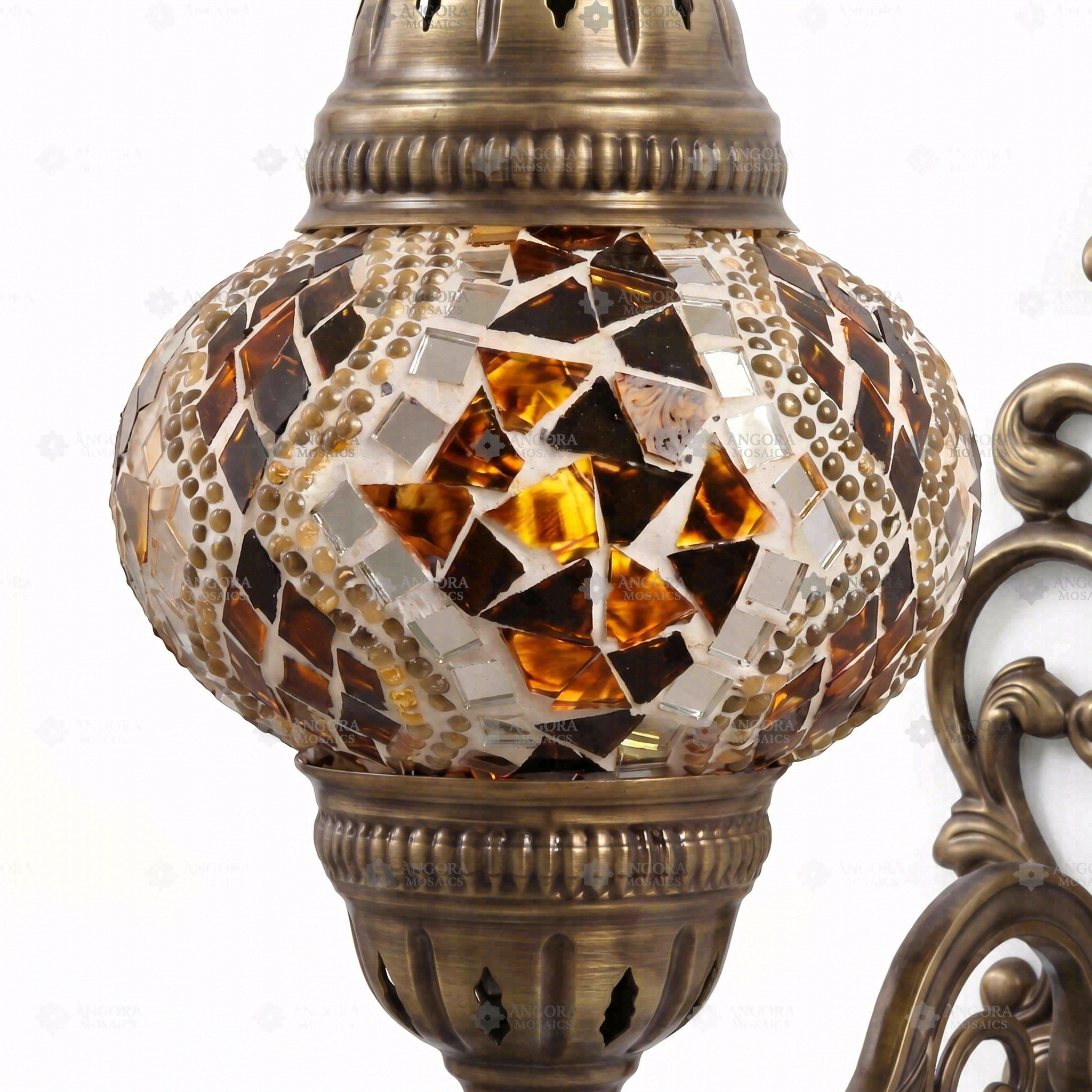 Close-up of Amber warm amber mosaic glass globe pattern — wall sconce (ENV APN2025)