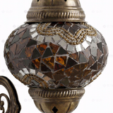 Close-up of Amber warm amber mosaic glass globe pattern — wall sconce (ENV APN2079)