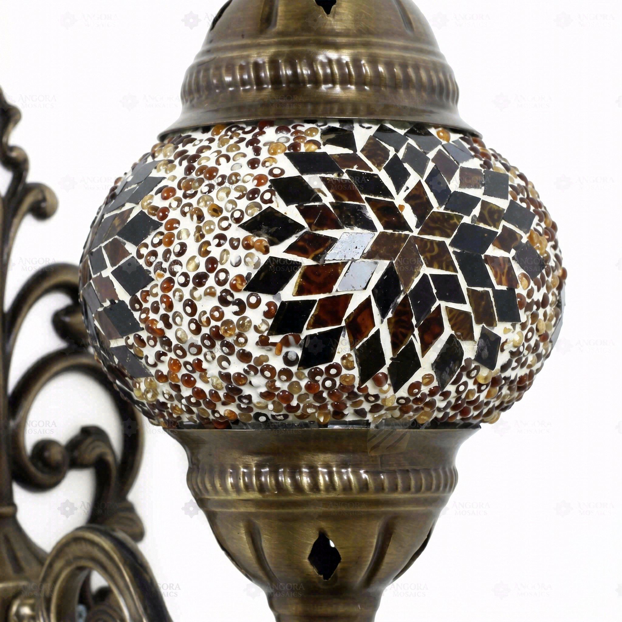 Close-up of Amber warm amber mosaic glass globe pattern — wall sconce (ENV APN2118)
