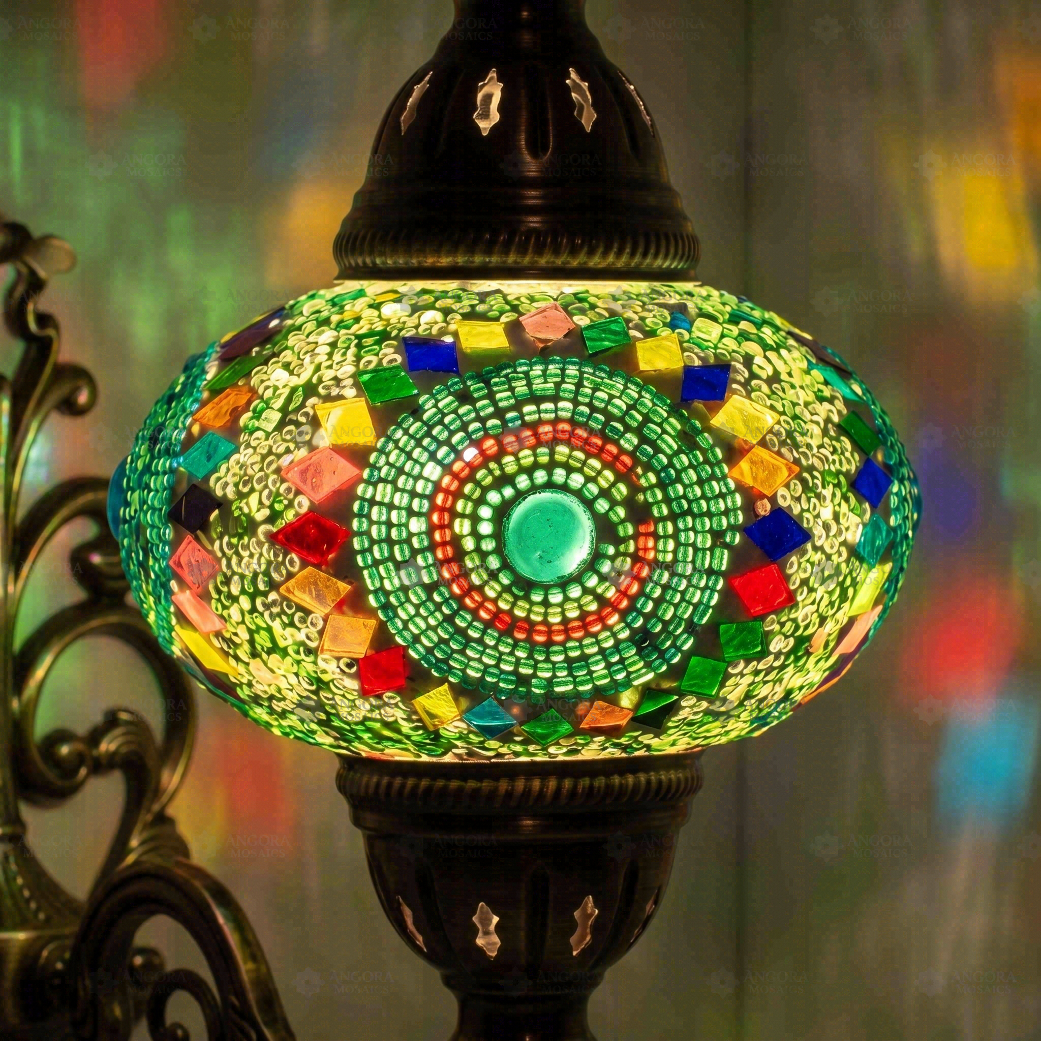 Lit close-up of mosaic glass globe — Blue wall sconce glowing (ENV APN3006)