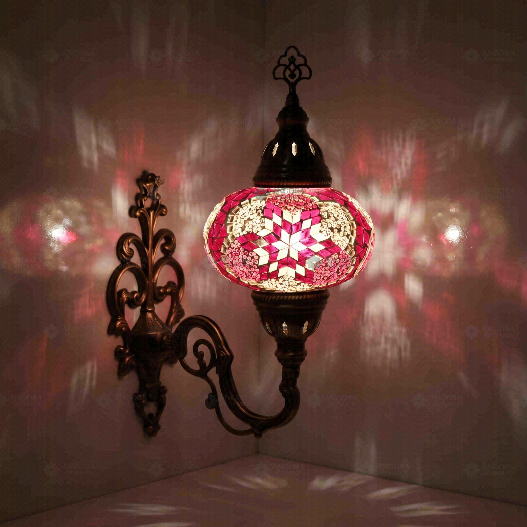 Pink Turkish mosaic wall sconce illuminated, showing colorful light projection (ENV APN3008)