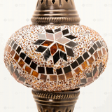 Close-up of Amber warm amber mosaic glass globe pattern — wall sconce (ENV APN3009)