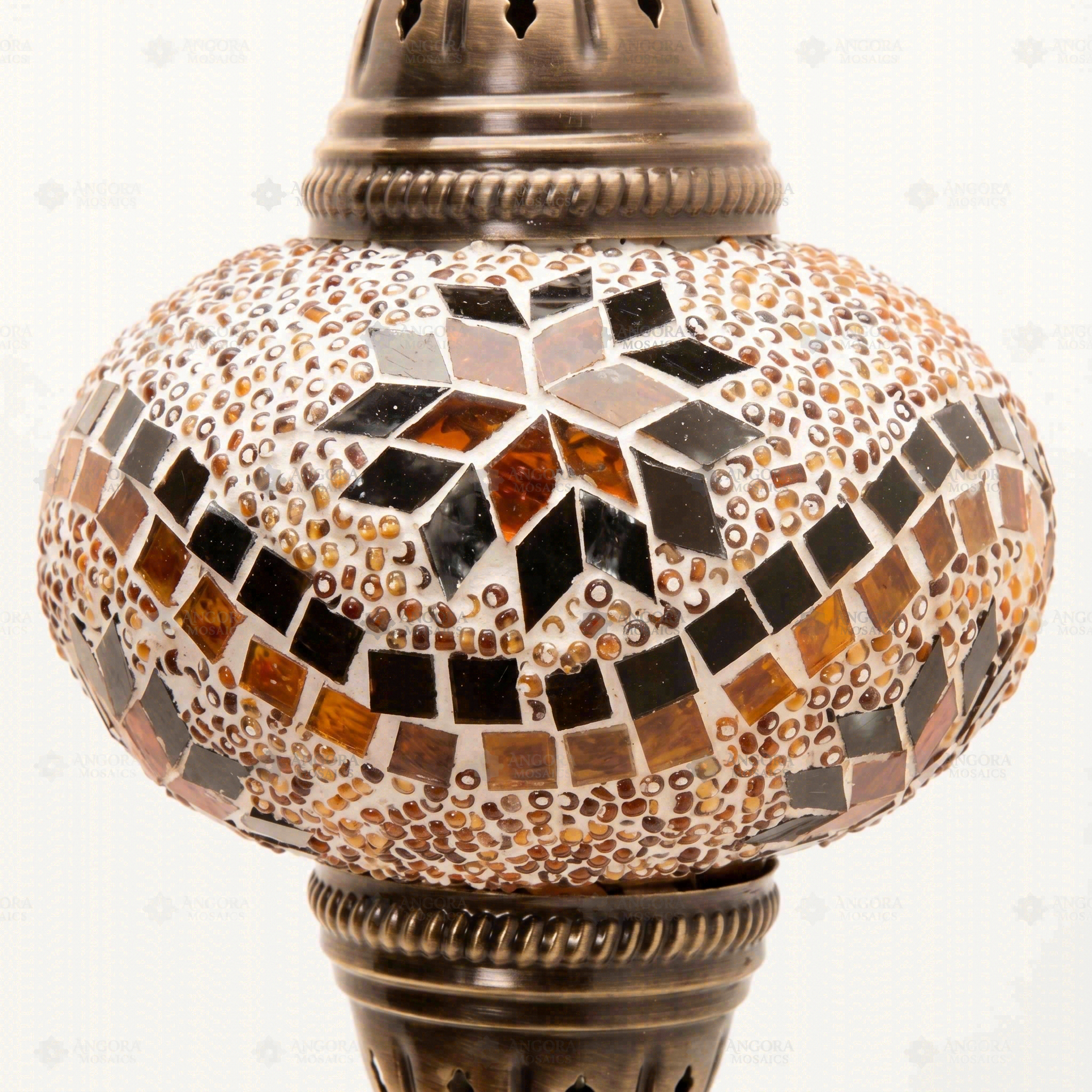 Close-up of Amber warm amber mosaic glass globe pattern — wall sconce (ENV APN3009)