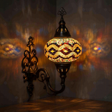 Multicolor Turkish mosaic wall sconce illuminated, showing colorful light projection (ENV APN3013)