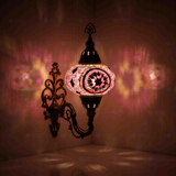 Pink Turkish mosaic wall sconce illuminated, showing colorful light projection (ENV APN3020)