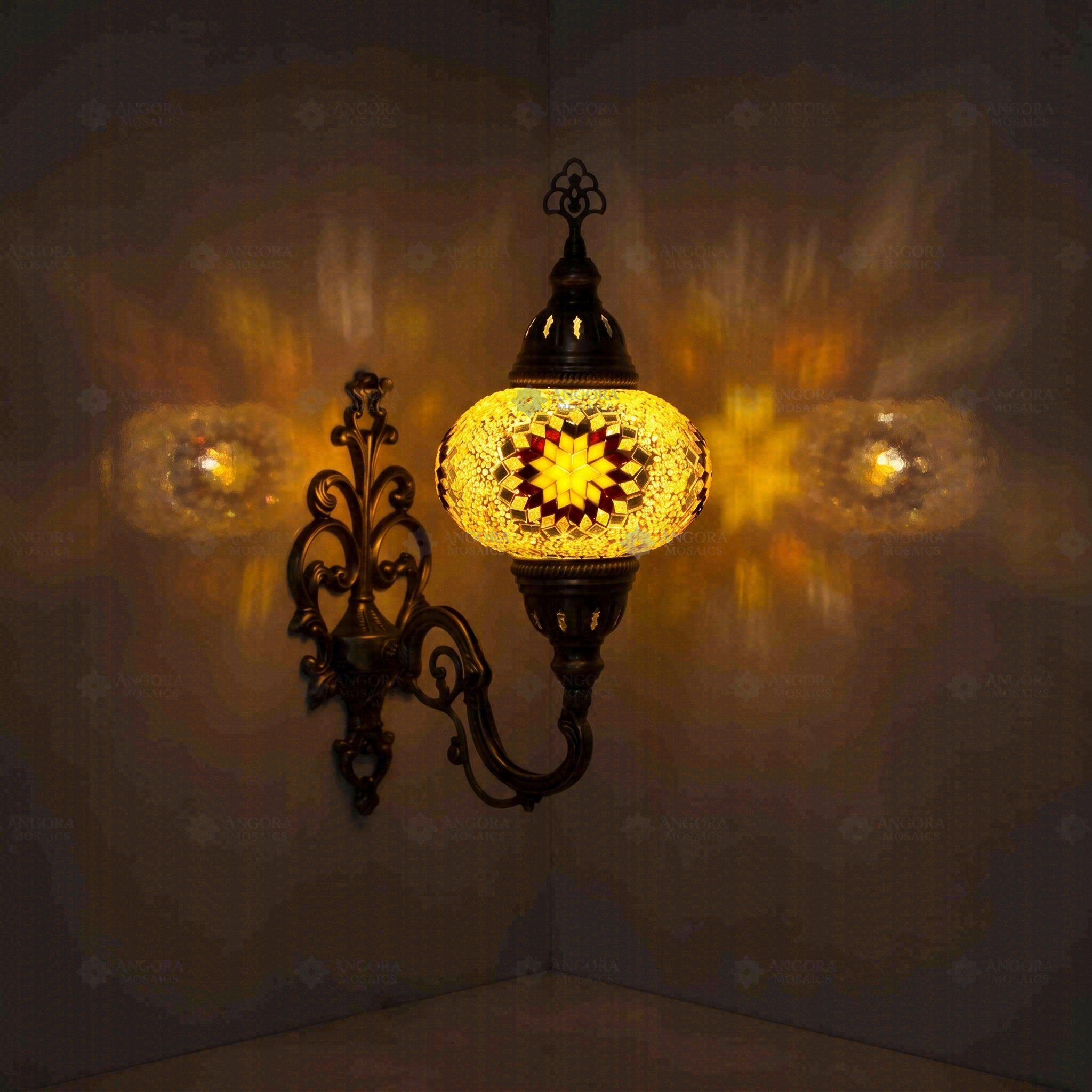 Amber Turkish mosaic wall sconce illuminated, showing colorful light projection (ENV APN3026)