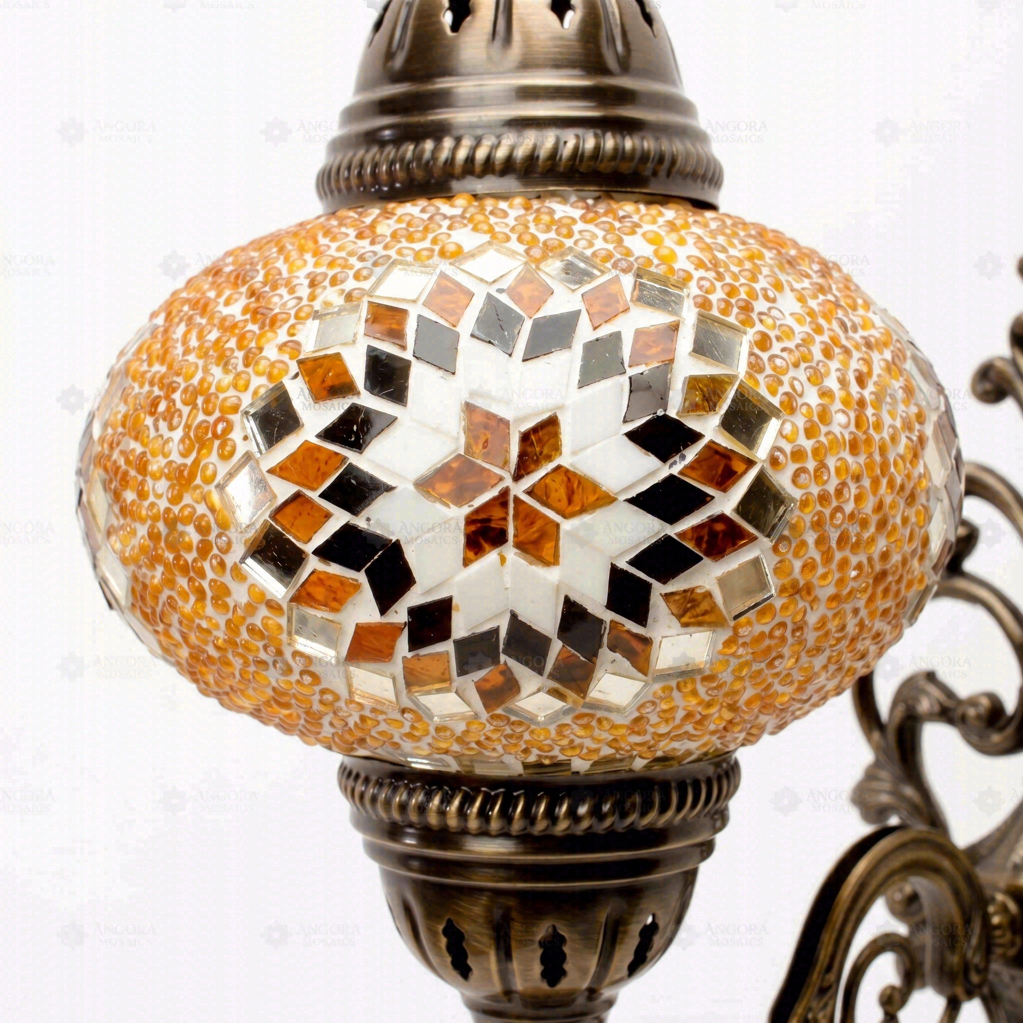Close-up of Amber warm amber mosaic glass globe pattern — wall sconce (ENV APN3026)