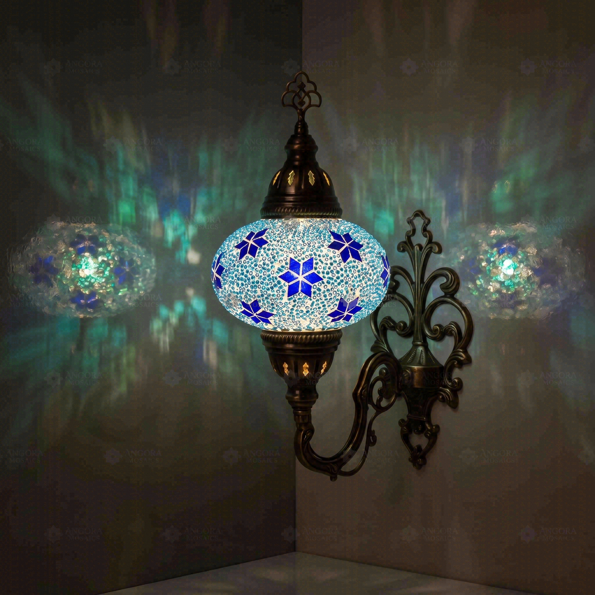 Blue Turkish mosaic wall sconce illuminated, showing colorful light projection (ENV APN3027)