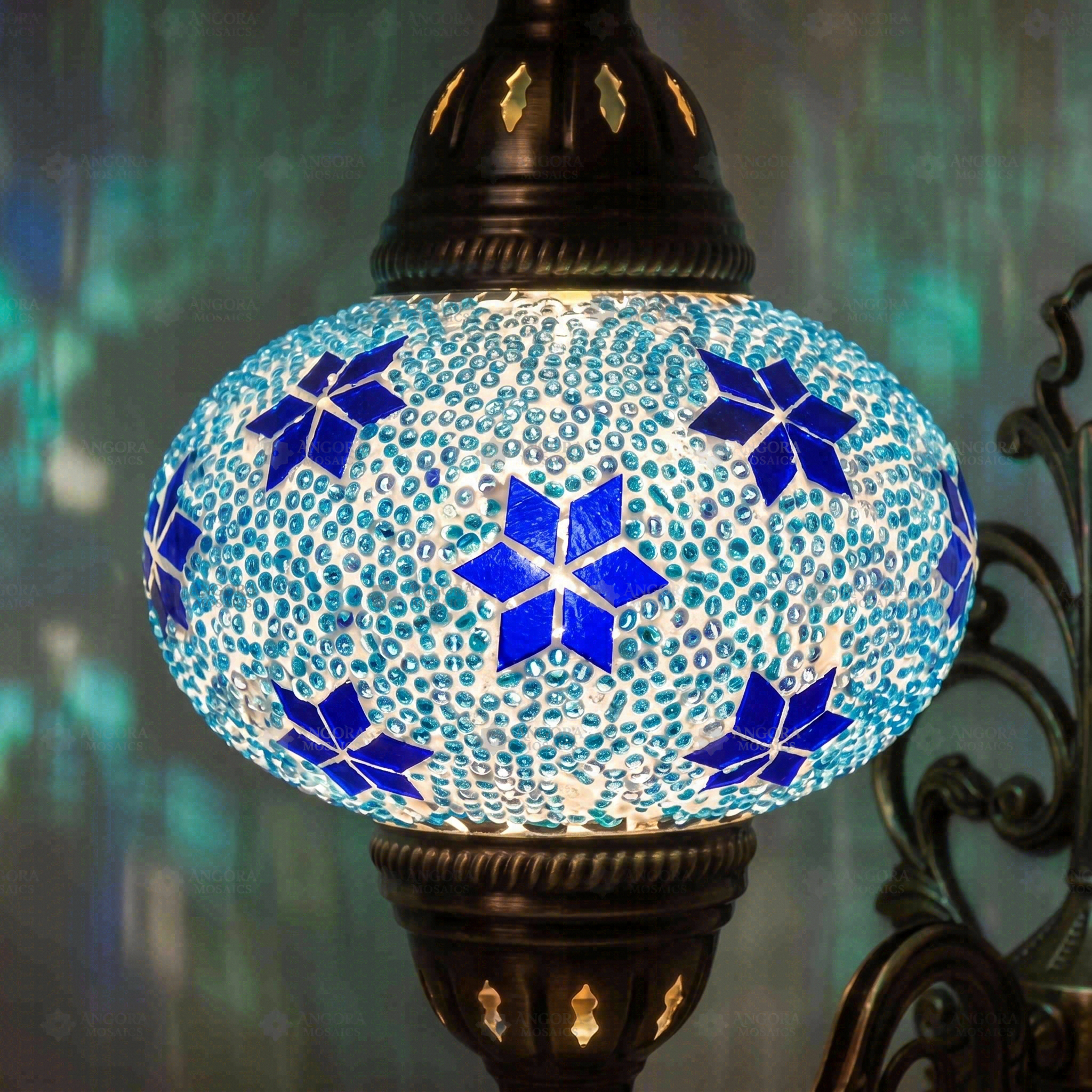 Lit close-up of mosaic glass globe — Blue wall sconce glowing (ENV APN3027)