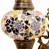 Close-up of Multicolor multicolor jewel mosaic glass globe pattern — wall sconce (ENV APN3029)