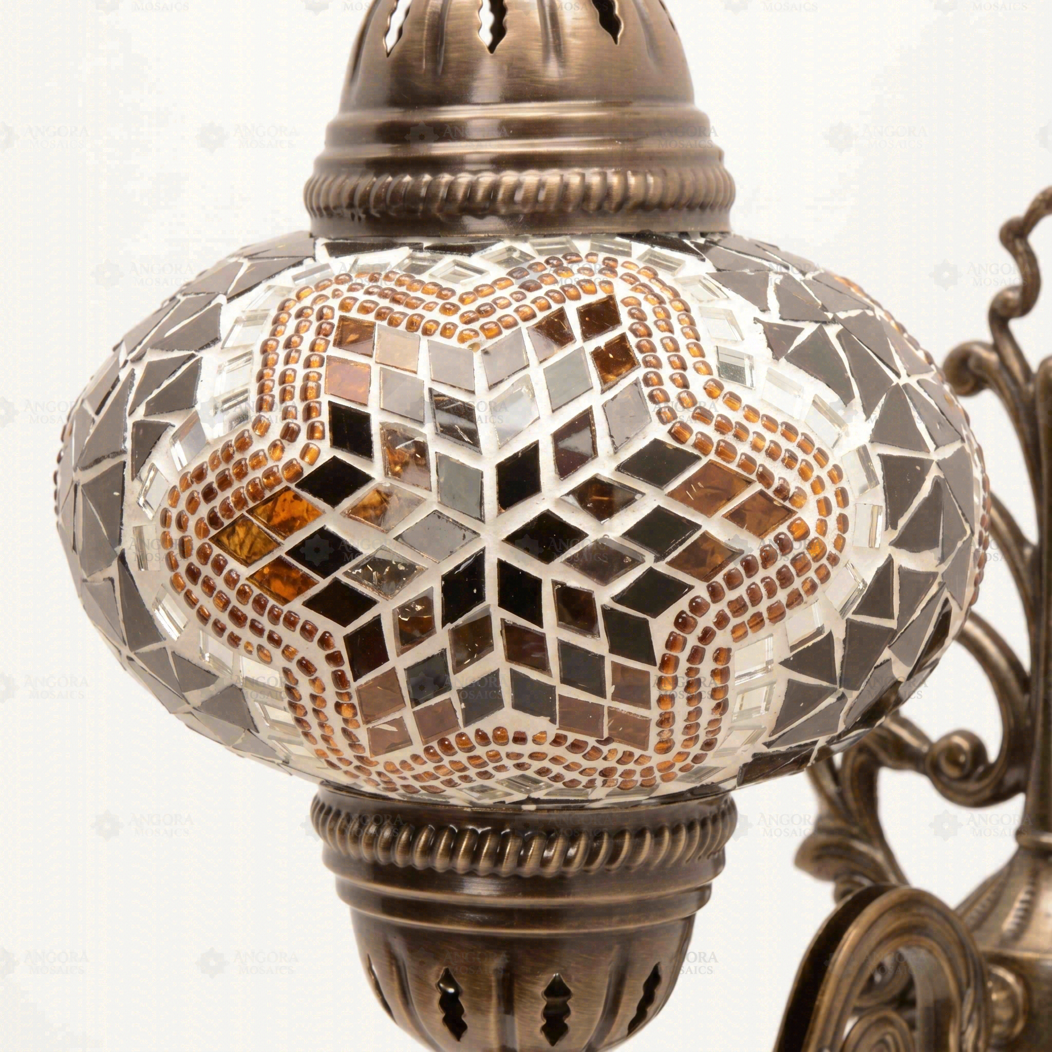 Close-up of Amber warm amber mosaic glass globe pattern — wall sconce (ENV APN3031)