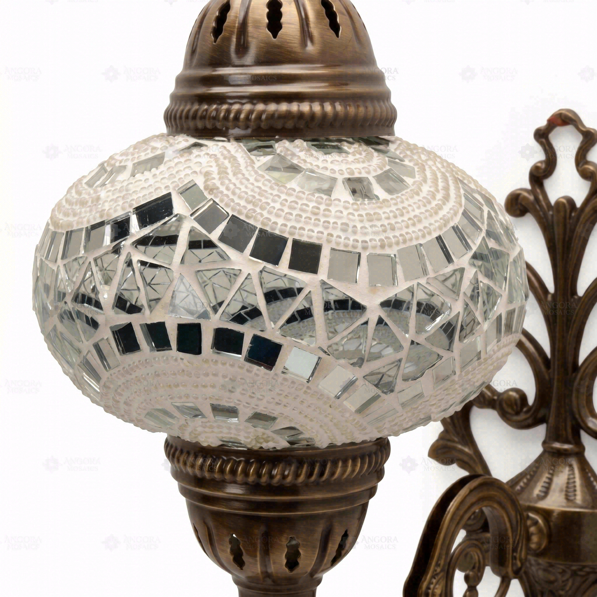 Close-up of White white glow mosaic glass globe pattern — wall sconce (ENV APN3036)