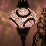 Lit close-up of mosaic glass globe — Purple wall sconce glowing (ENV APN3041)