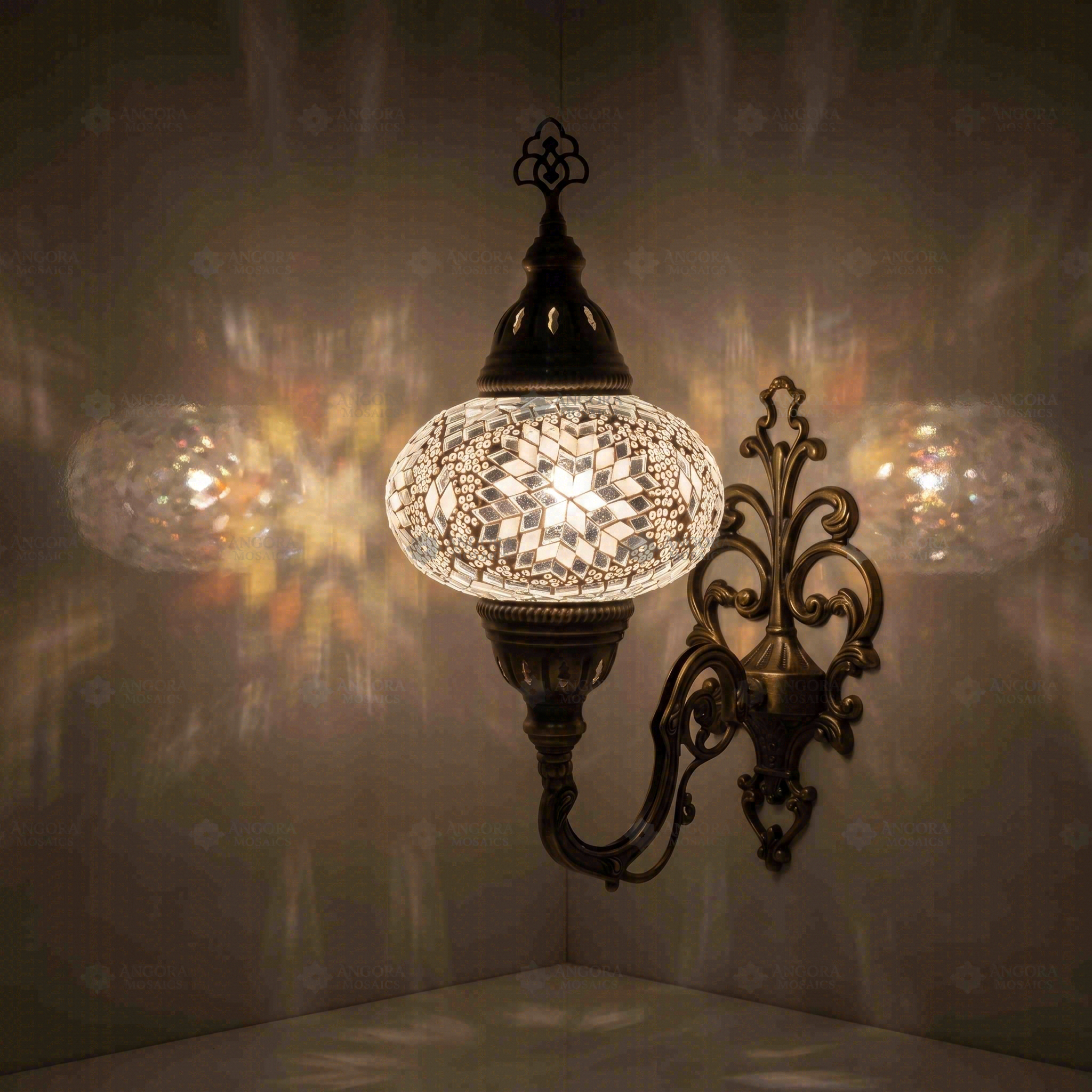 White Turkish mosaic wall sconce illuminated, showing colorful light projection (ENV APN3043)