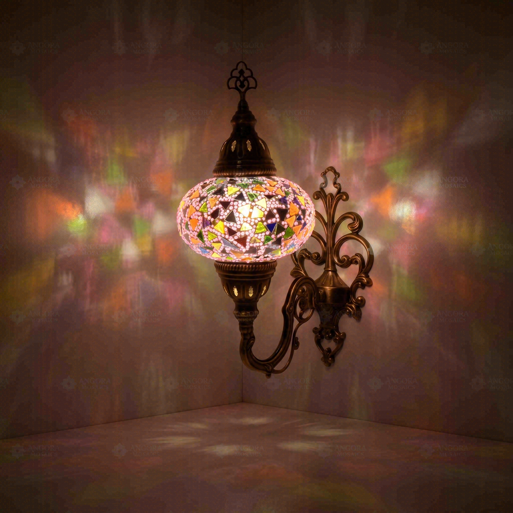 Pink Turkish mosaic wall sconce illuminated, showing colorful light projection (ENV APN3046)