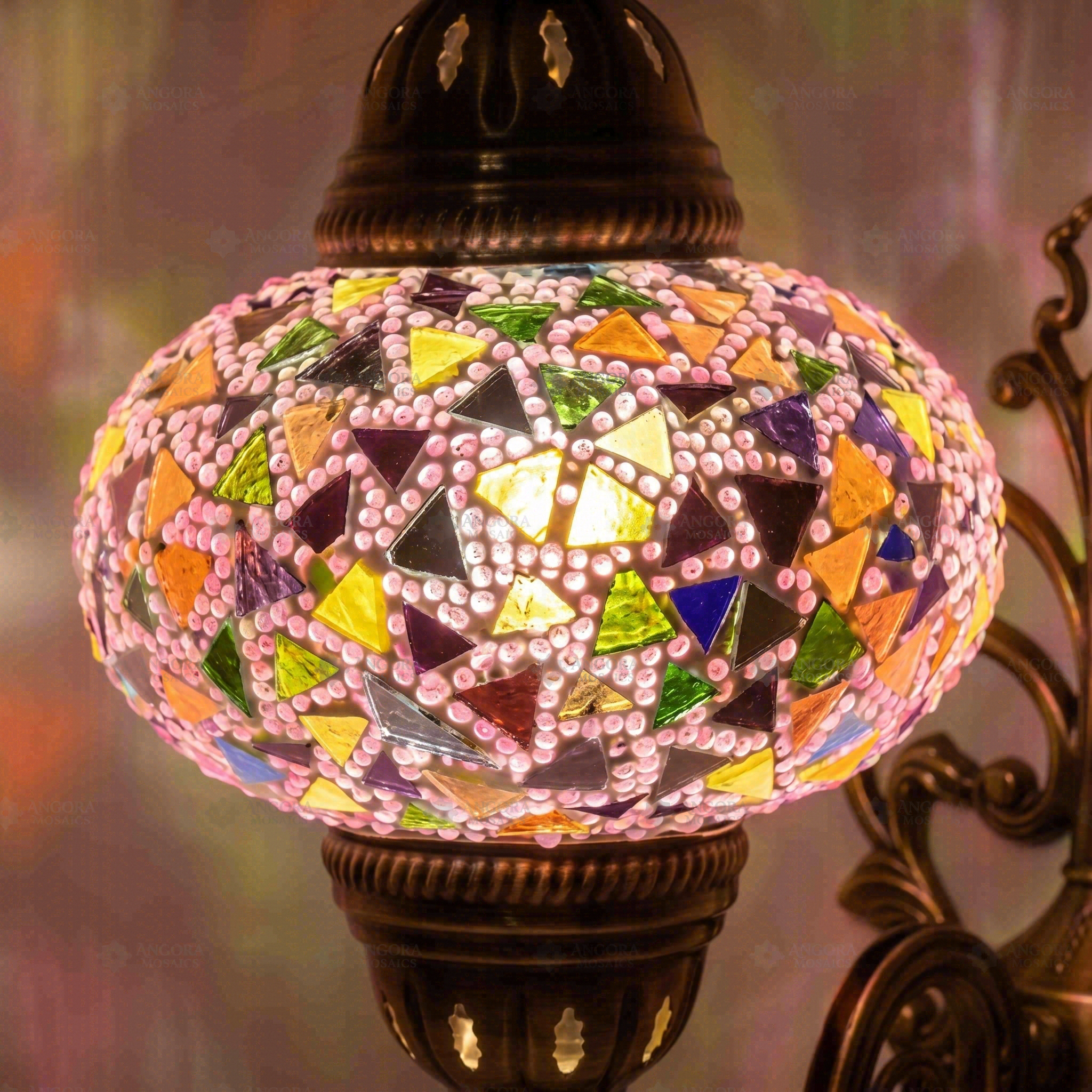 Lit close-up of mosaic glass globe — Pink wall sconce glowing (ENV APN3046)