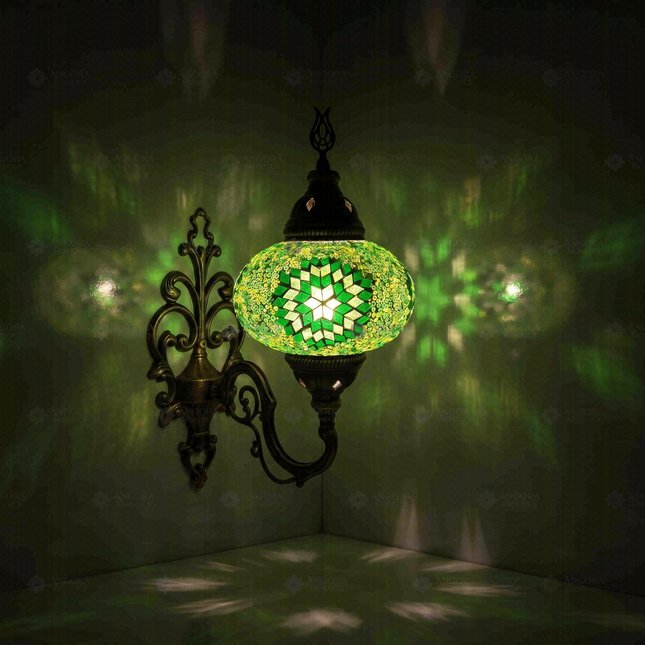 Green Turkish mosaic wall sconce illuminated, showing colorful light projection (ENV APN3048)