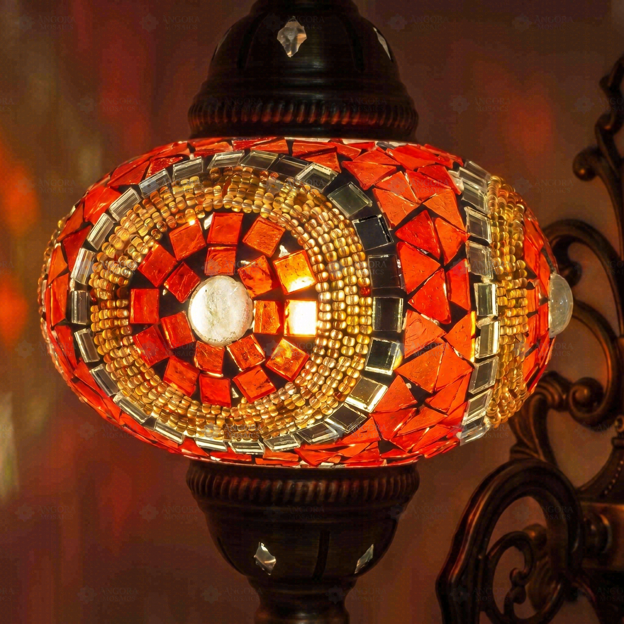 Lit close-up of mosaic glass globe — Red wall sconce glowing (ENV APN3052)