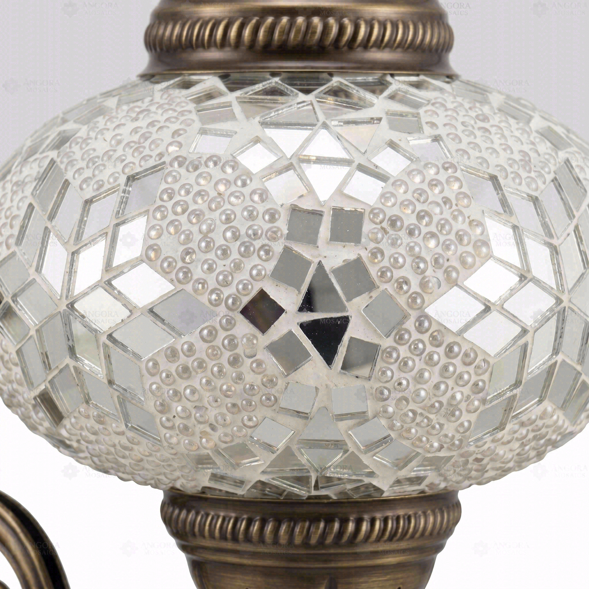 Close-up of White white glow mosaic glass globe pattern — wall sconce (ENV APN3054)