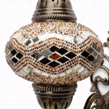 Close-up of Amber warm amber mosaic glass globe pattern — wall sconce (ENV APN3057)