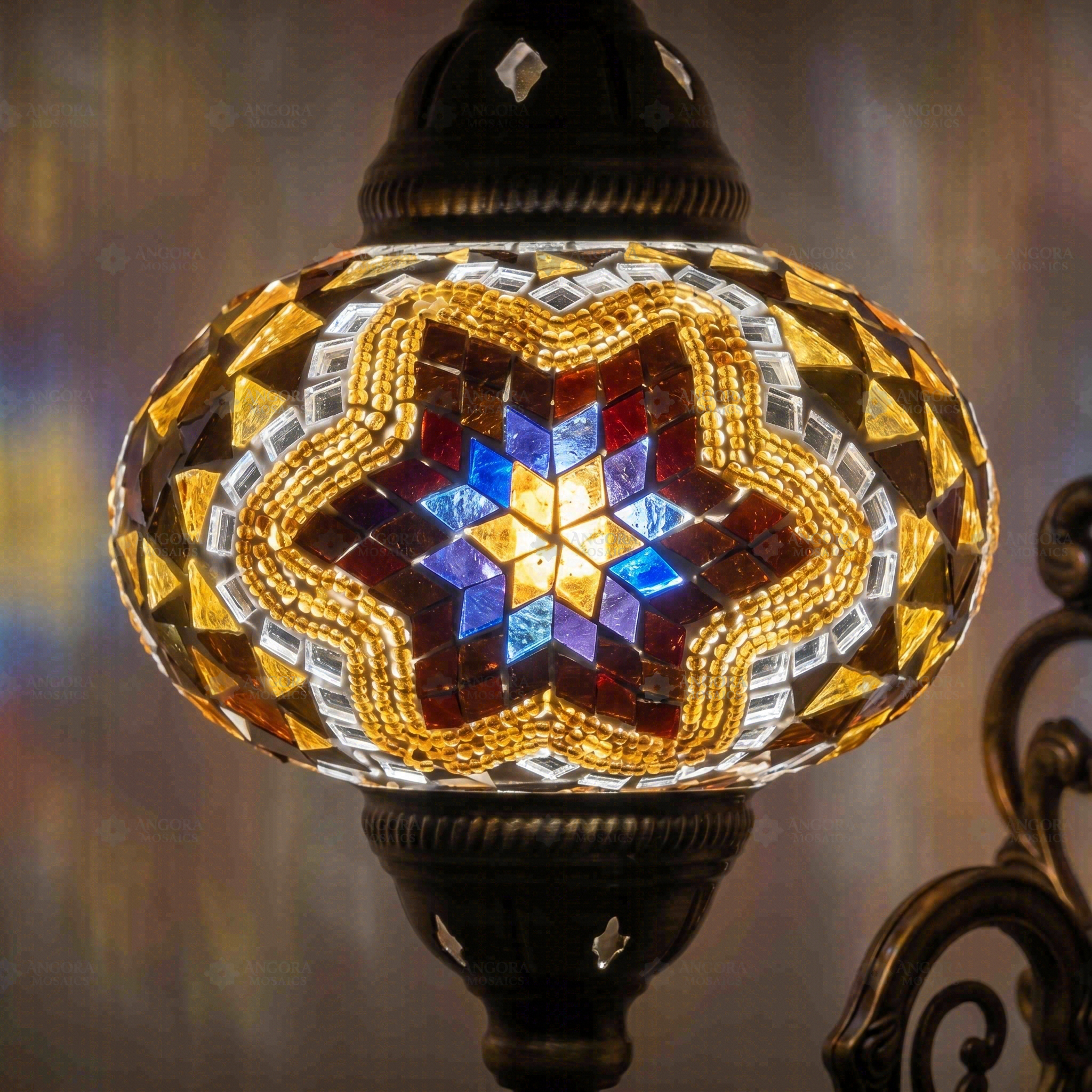 Lit close-up of mosaic glass globe — Warm Tones wall sconce glowing (ENV APN3063)