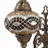 Close-up of Amber warm amber mosaic glass globe pattern — wall sconce (ENV APN3064)