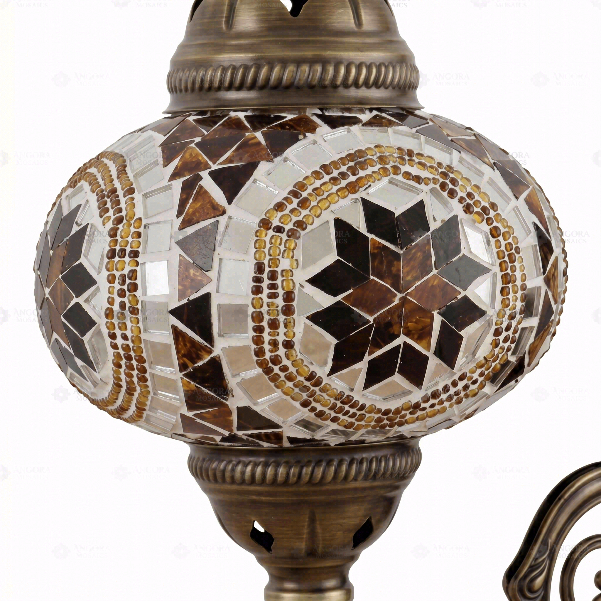 Close-up of Amber warm amber mosaic glass globe pattern — wall sconce (ENV APN3067)