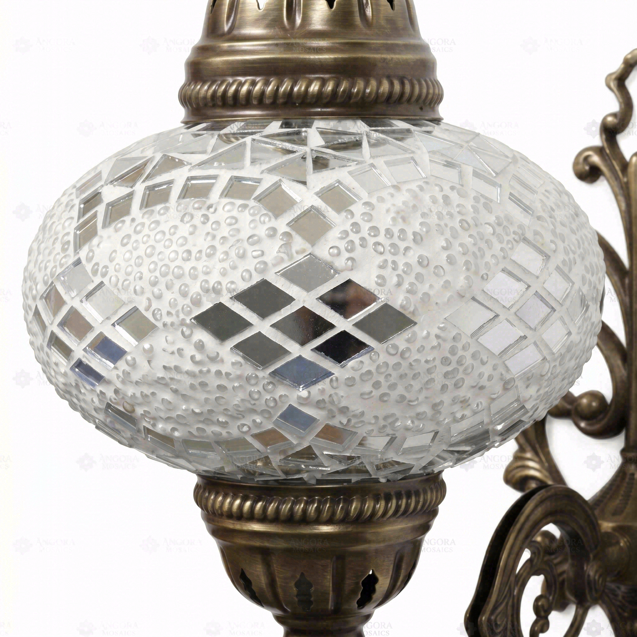 Close-up of White white glow mosaic glass globe pattern — wall sconce (ENV APN3068)
