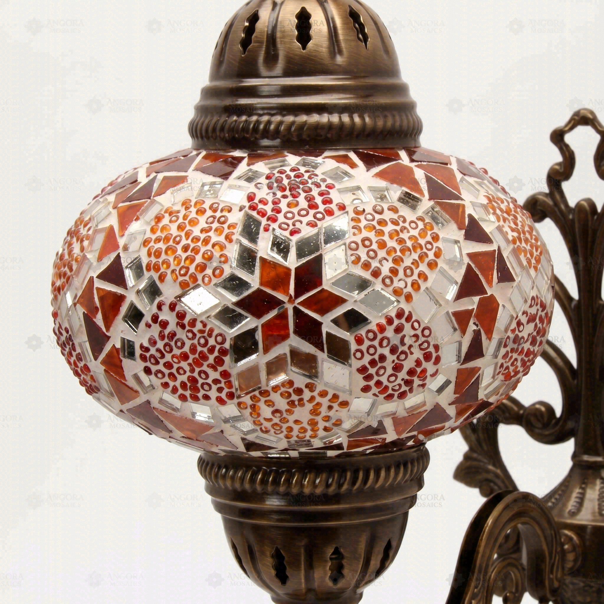 Close-up of Amber warm amber mosaic glass globe pattern — wall sconce (ENV APN3079)