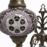Close-up of Purple purple jewel mosaic glass globe pattern — wall sconce (ENV APN3087)