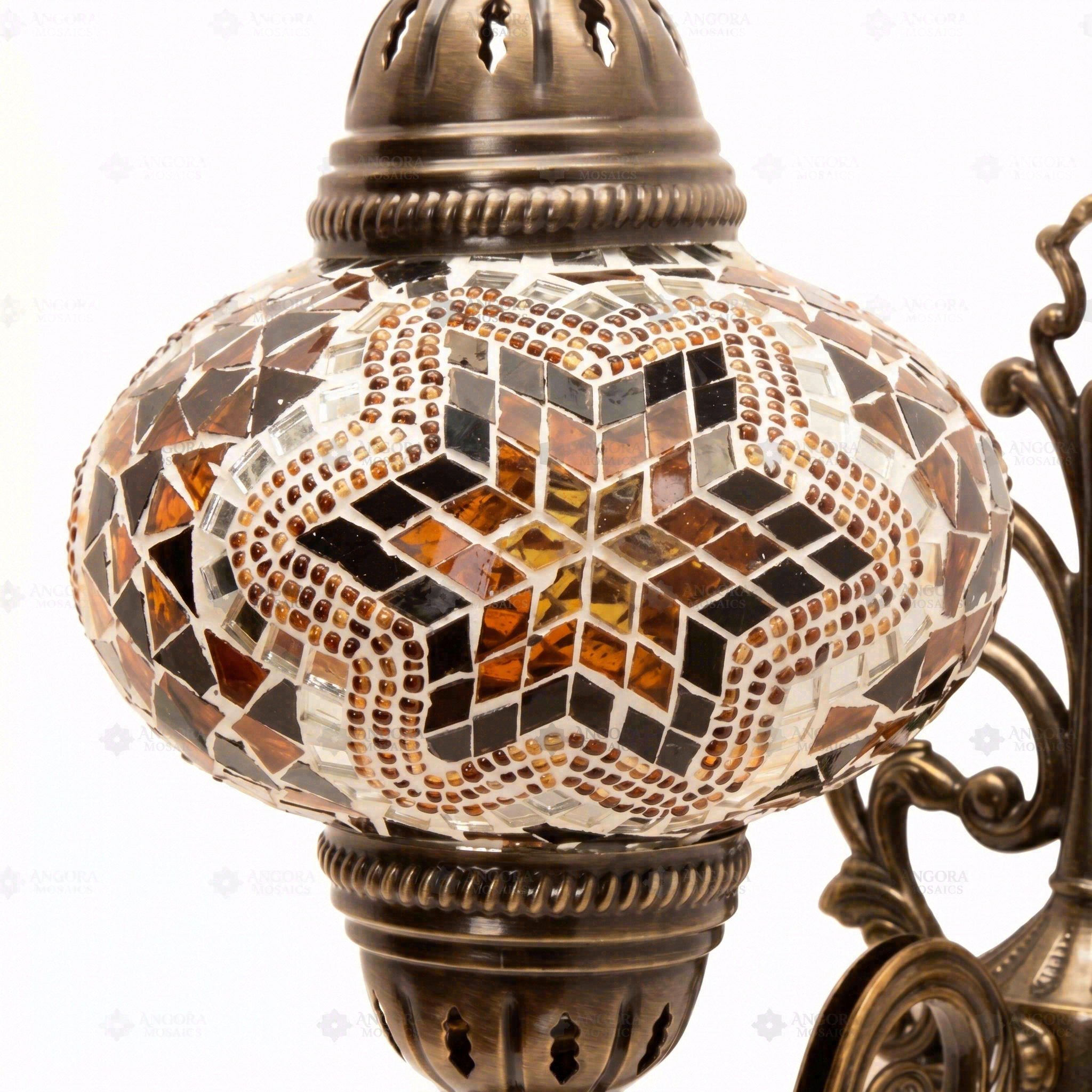 Close-up of Amber warm amber mosaic glass globe pattern — wall sconce (ENV APN3088)