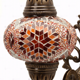 Close-up of Amber warm amber mosaic glass globe pattern — wall sconce (ENV APN3090)