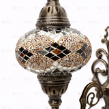 Close-up of Amber warm amber mosaic glass globe pattern — wall sconce (ENV APN3092)