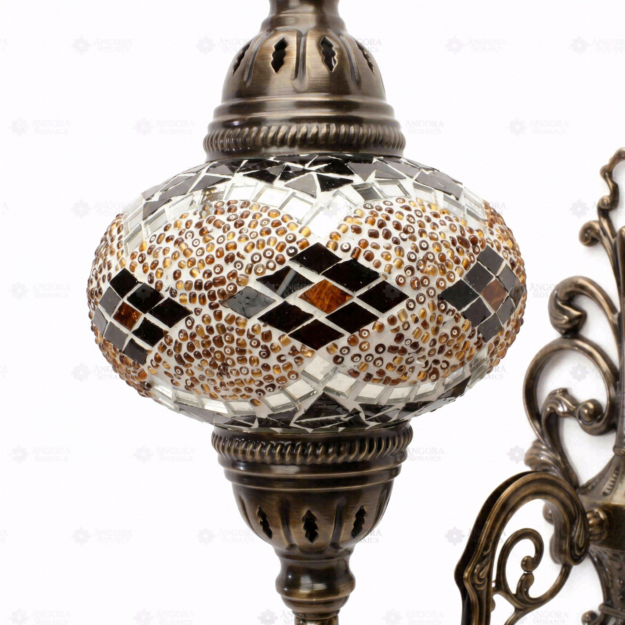 Close-up of Amber warm amber mosaic glass globe pattern — wall sconce (ENV APN3092)