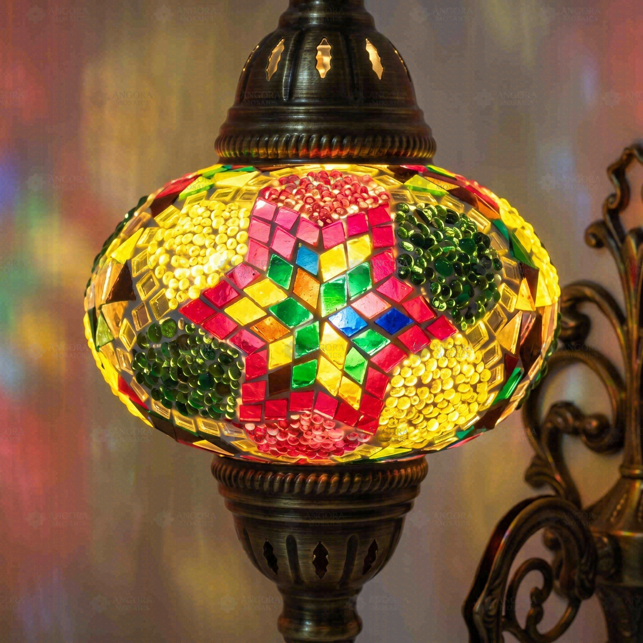 Lit close-up of mosaic glass globe — Multicolor wall sconce glowing (ENV APN3093)