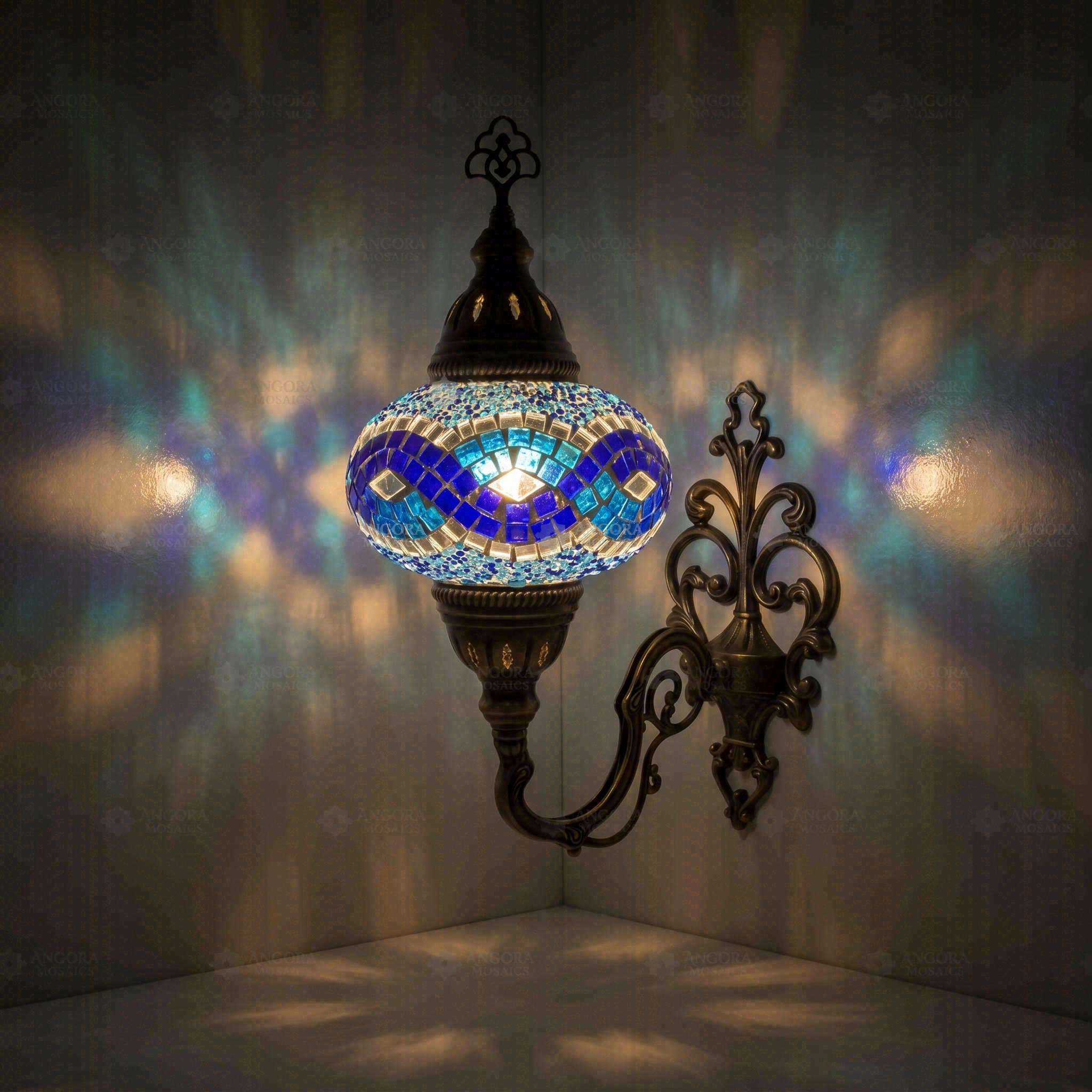 Blue Turkish mosaic wall sconce illuminated, showing colorful light projection (ENV APN3094)