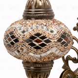 Close-up of Amber warm amber mosaic glass globe pattern — wall sconce (ENV APN3097)