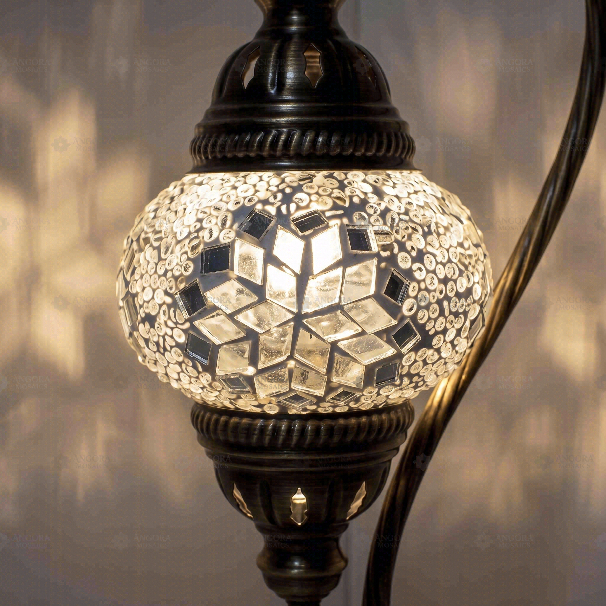 Lit close-up of mosaic glass globe — White table lamp glowing (ENV DVN1001)