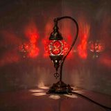 Red Turkish mosaic table lamp illuminated, showing colorful light projection (ENV DVN1003)