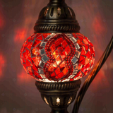Lit close-up of mosaic glass globe — Red table lamp glowing (ENV DVN1003)