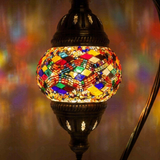 Lit close-up of mosaic glass globe — Multicolor table lamp glowing (ENV DVN1010)