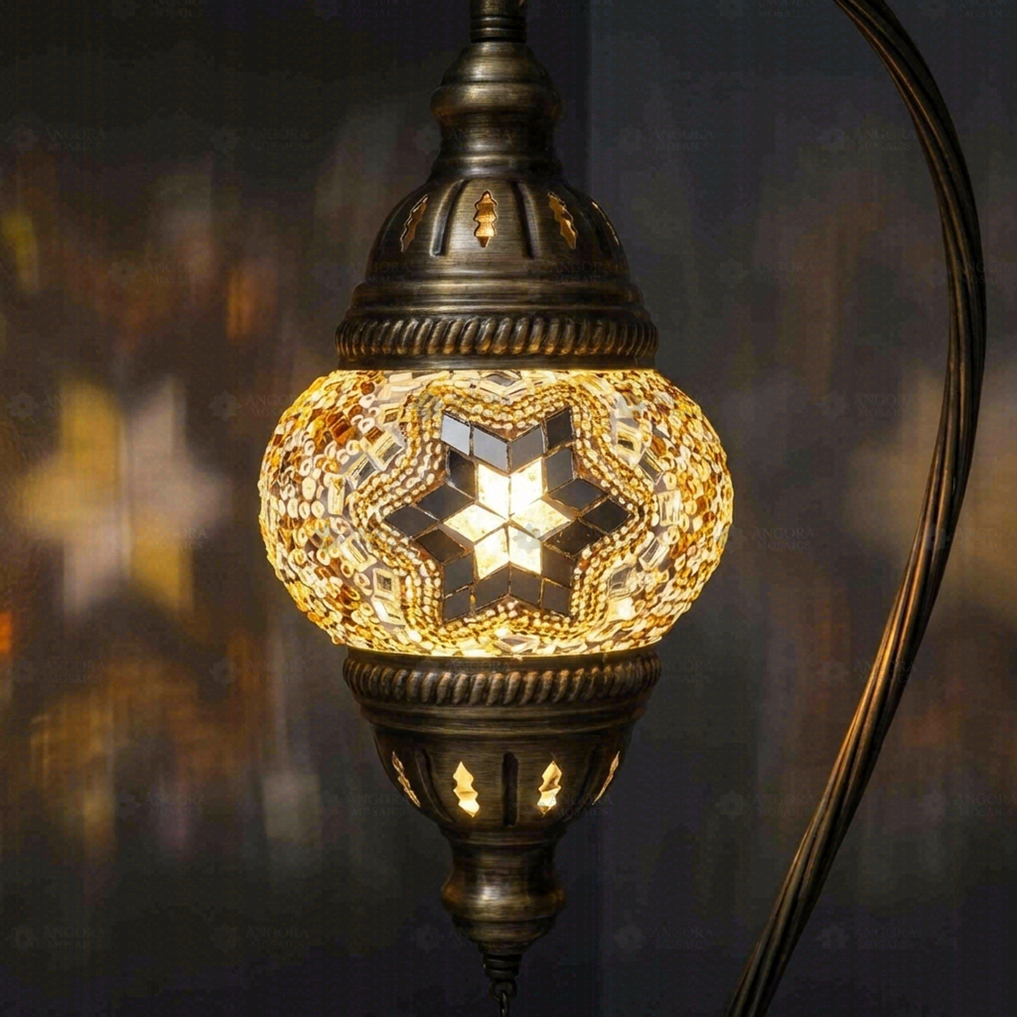 Lit close-up of mosaic glass globe — Amber table lamp glowing (ENV DVN1022)