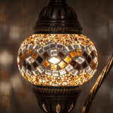Lit close-up of mosaic glass globe — Clear table lamp glowing (ENV DVN1023)