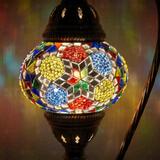 Lit close-up of mosaic glass globe — Multicolor table lamp glowing (ENV DVN2008)