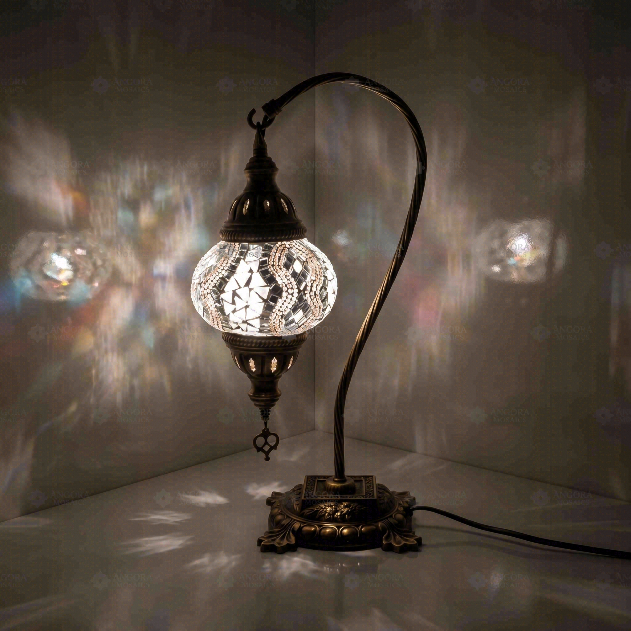 White Turkish mosaic table lamp illuminated, showing colorful light projection (ENV DVN2017)