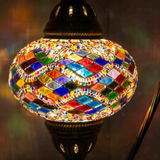 Lit close-up of mosaic glass globe — Multicolor table lamp glowing (ENV DVN3002)