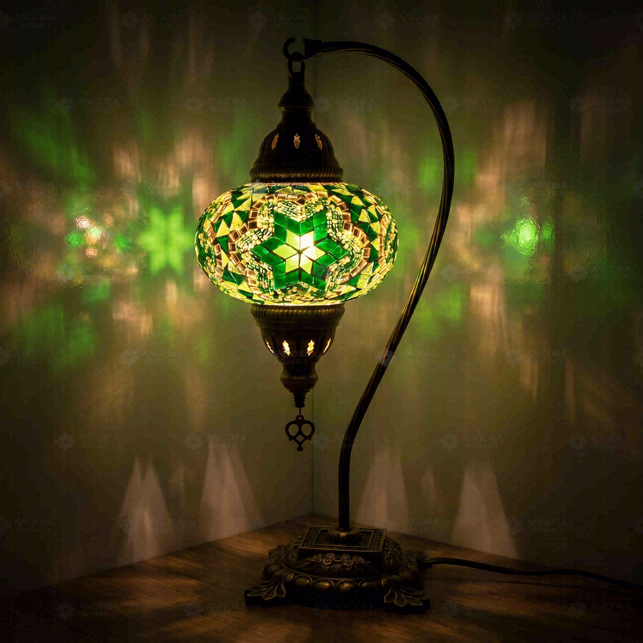 Green Turkish mosaic table lamp illuminated, showing colorful light projection (ENV DVN3003)