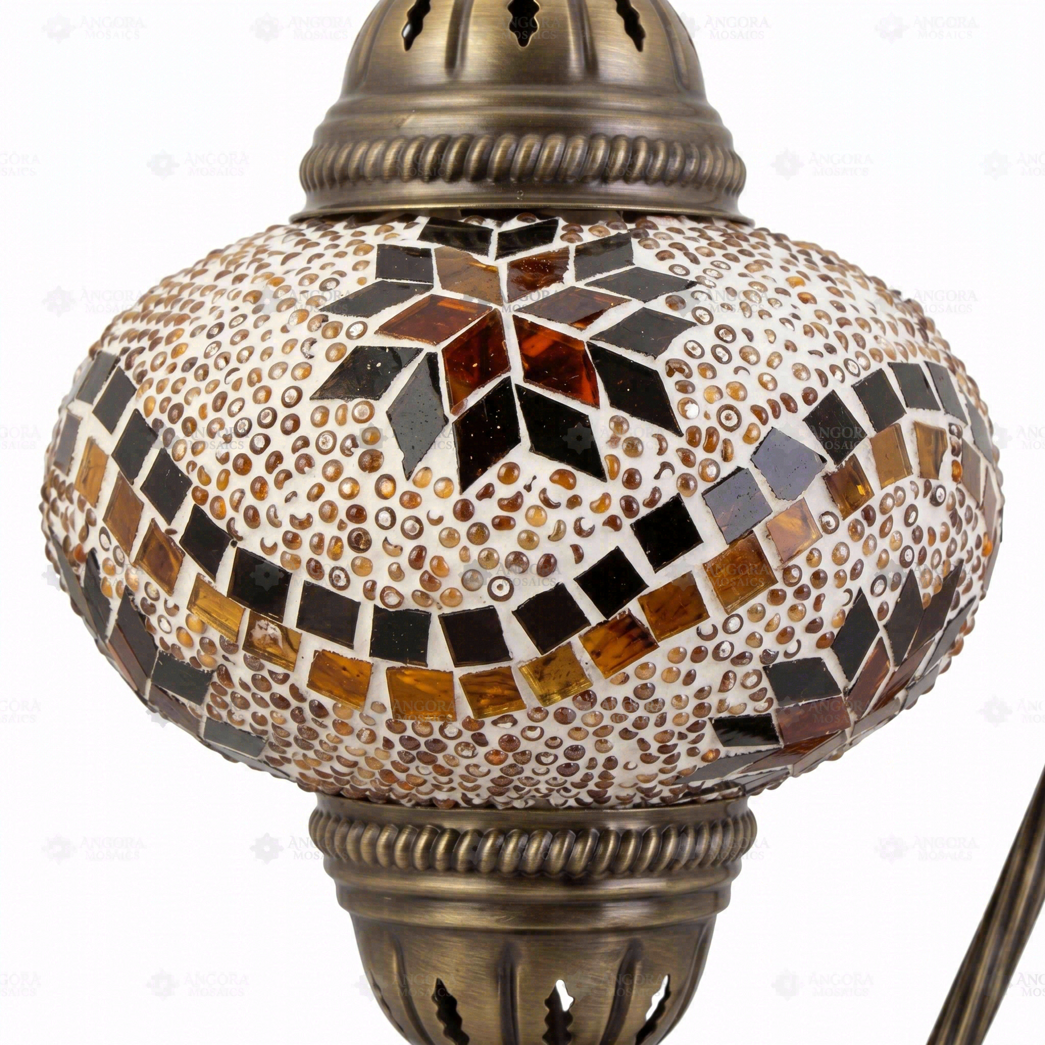 Close-up of Amber warm amber mosaic glass globe pattern — table lamp (ENV DVN3009)