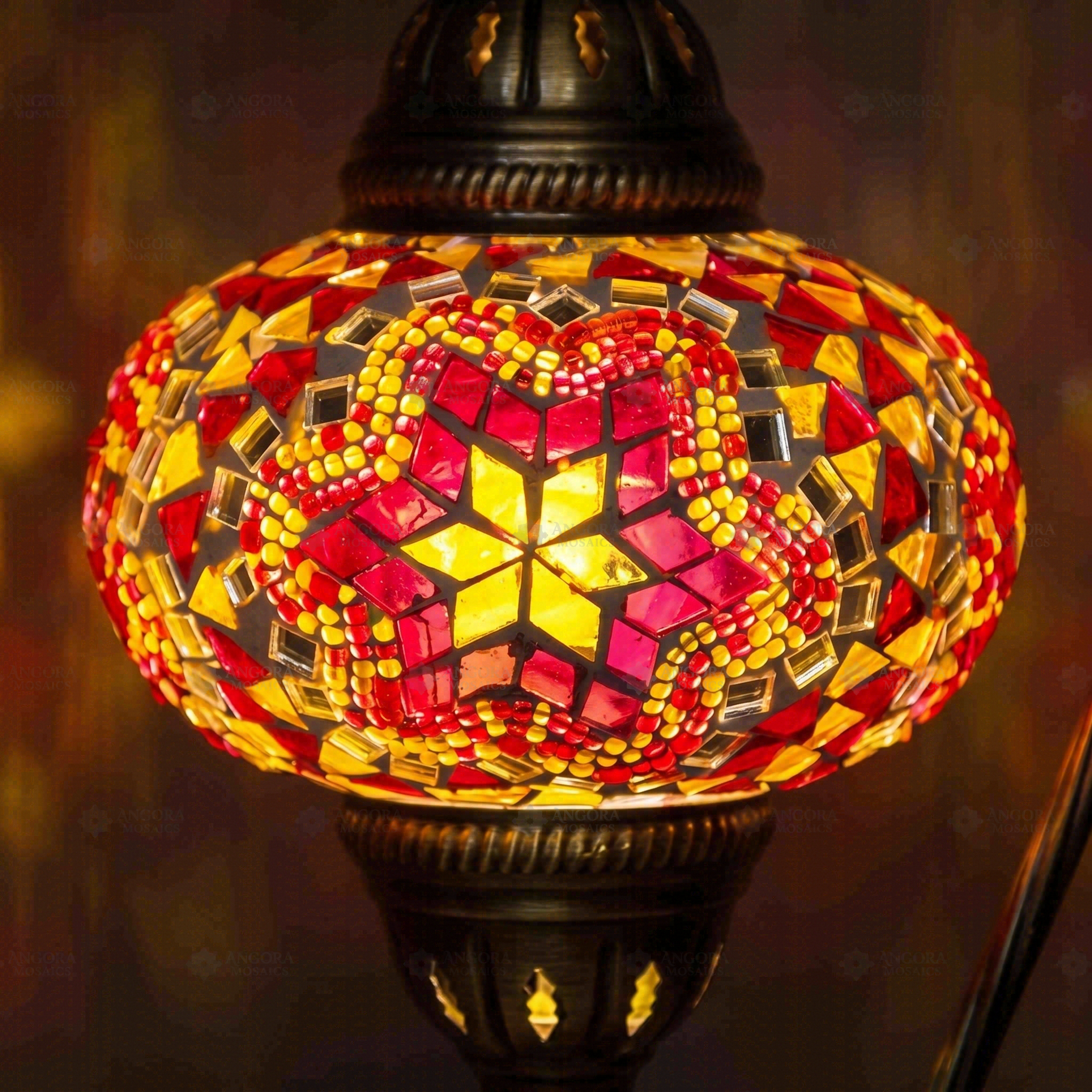 Lit close-up of mosaic glass globe — Amber table lamp glowing (ENV DVN3011)