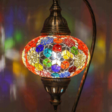 Lit close-up of mosaic glass globe — Multicolor table lamp glowing (ENV DVN3012)